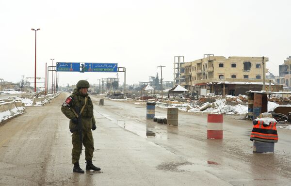 Патруль российской военной полиции в районе освобожденного от боевиков города Маарет-Нууман в провинции Идлиб Патруль российской военной полиции в районе освобожденного от боевиков города Маарет-Нууман в провинции Идлиб