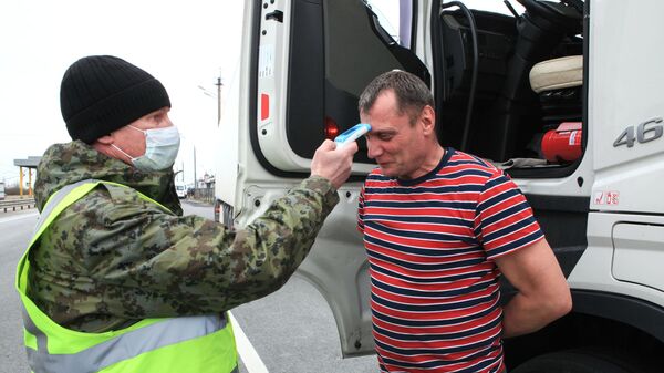 Измерение температуры у водителей в рамках профилактики коронавируса Измерение температуры у водителей в рамках профилактики коронавируса
