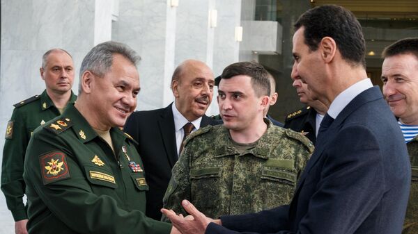 Министр обороны РФ генерал армии Сергей Шойгу и президент Сирийской Арабской Республики Башар Асад во время встречи в Дамаске Министр обороны РФ генерал армии Сергей Шойгу и президент Сирийской Арабской Республики Башар Асад во время встречи в Дамаске