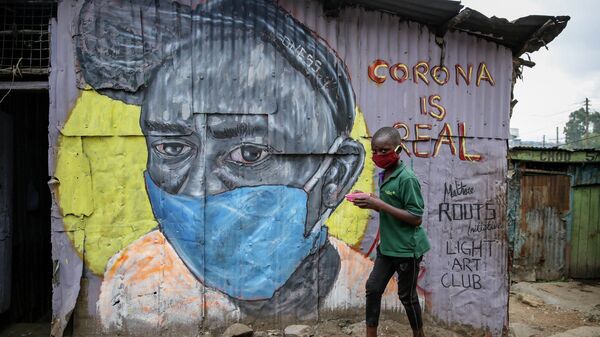 Информационное граффити художников the Mathare Roots, предупреждающее об опасности коронавируса в Найроби, Кения Информационное граффити художников the Mathare Roots, предупреждающее об опасности коронавируса в Найроби, Кения