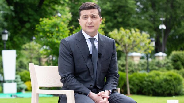 Президент Украины Владимир Зеленский во время пресс-конференции, посвященной первой годовщине пребывания на посту Президент Украины Владимир Зеленский во время пресс-конференции, посвященной первой годовщине пребывания на посту