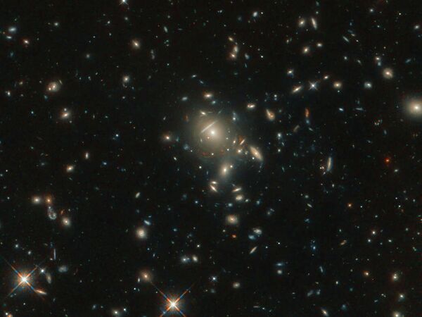 Галактики PLCK G045.1 + 61.1 сфотографированная телескопом Хаббл Галактики PLCK G045.1 + 61.1 сфотографированная телескопом Хаббл