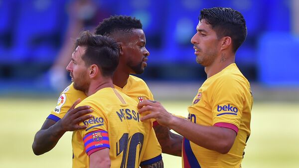 Barcelona's Portuguese defender Nelson Semedo (C) celebrates his goal with teammates Barcelona's Uruguayan forward Luis Suarez (R) and Barcelona's Argentinian forward Lionel Messi during the Spanish league football match between Deportivo Alaves and FC Barcelona at the Mendizorroza stadium in Vitoria on July 19, 2020. (Photo by ANDER GILLENEA / AFP) Barcelona's Portuguese defender Nelson Semedo (C) celebrates his goal with teammates Barcelona's Uruguayan forward Luis Suarez (R) and Barcelona's Argentinian forward Lionel Messi during the Spanish league football match between Deportivo Alaves and FC Barcelona at the Mendizorroza stadium in Vitoria on July 19, 2020. (Photo by ANDER GILLENEA / AFP)