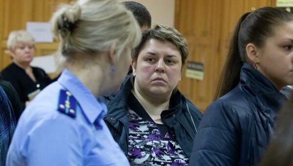 Александра Апатченко на суде над Николаем Ковалевичем, предполагаемым убийцей ее дочери Александра Апатченко на суде над Николаем Ковалевичем, предполагаемым убийцей ее дочери