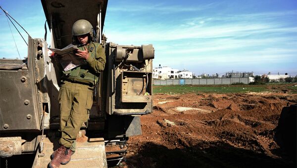 Боец армии Израиля. Архивное фото Боец армии Израиля. Архивное фото