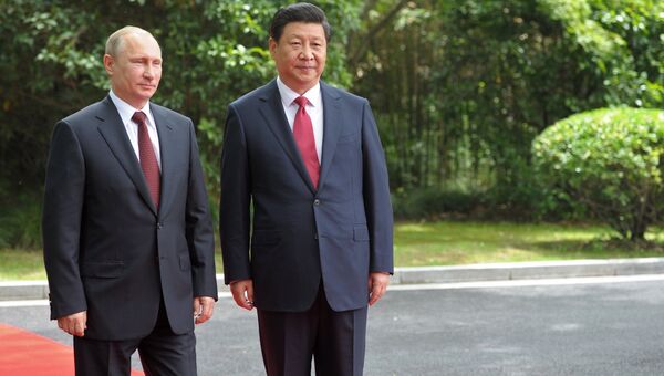 Президент России Владимир Путин и председатель Китайской народной республики Си Цзиньпин. Архивное фото Президент России Владимир Путин и председатель Китайской народной республики Си Цзиньпин. Архивное фото