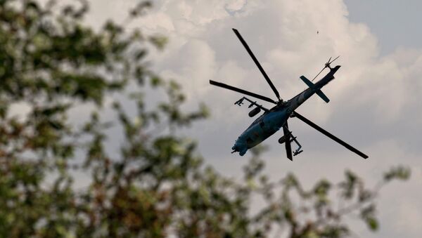 Украинский боевой вертолет в небе. Архивное фото. Украинский боевой вертолет в небе. Архивное фото.