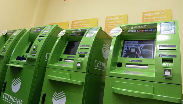 Банкоматы в подразделении ОАО Сбербанк России. Архивное фото Банкоматы в подразделении ОАО Сбербанк России. Архивное фото