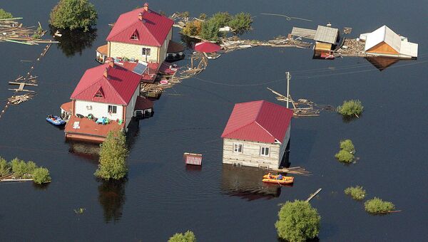 Пострадавшее от паводка село Владимирское в РФ. Архивное фото Пострадавшее от паводка село Владимирское в РФ. Архивное фото