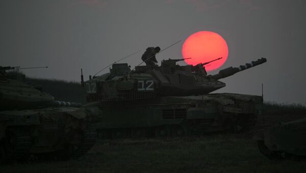 Израильские военные возле сектора Газа 21 июля 2014 Израильские военные возле сектора Газа 21 июля 2014