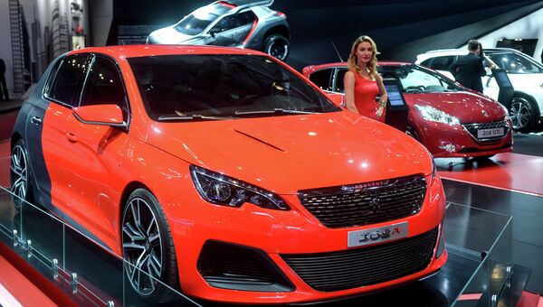 Автомобиль Peugeot 308R на Московском международном автомобильном салоне. Архивное фото Автомобиль Peugeot 308R на Московском международном автомобильном салоне. Архивное фото