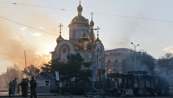 Последствия обстрела Донецка. Архивное фото Последствия обстрела Донецка. Архивное фото
