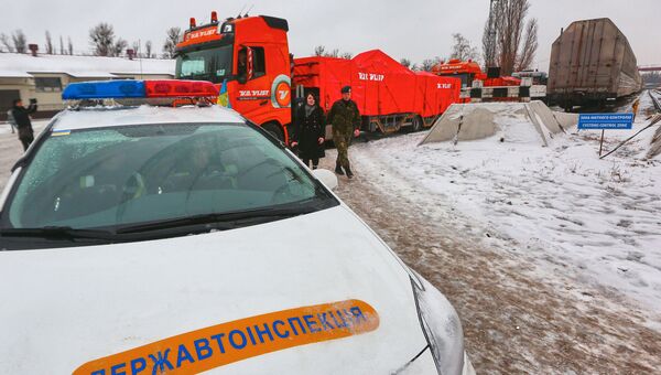 Из Харькова в Нидерланды отправили четыре автомобиля с обломками Боинг-777. Архивное фото Из Харькова в Нидерланды отправили четыре автомобиля с обломками Боинг-777. Архивное фото