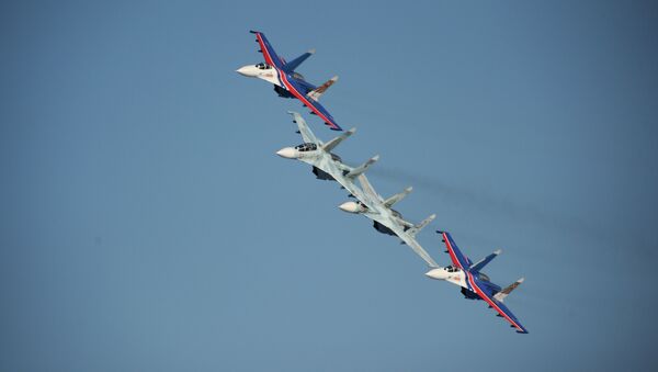 Участники пилотажной группы Соколы России. Архивное фото Участники пилотажной группы Соколы России. Архивное фото