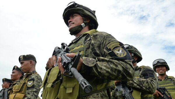 Филиппинские военнослужащие. Архивное фото Филиппинские военнослужащие. Архивное фото