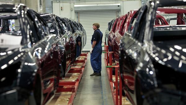 Начало производства малогабаритных автомобилей Opel Astra на заводе General Motors в производственной зоне Шушары-2 Санкт-Петербурга. Архивное фото Начало производства малогабаритных автомобилей Opel Astra на заводе General Motors в производственной зоне Шушары-2 Санкт-Петербурга. Архивное фото