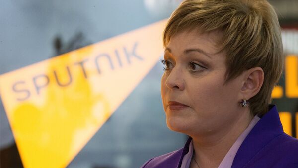 Губернатор Мурманской области Марина Ковтун у павильона новостного агентства Sputnik на XIX Петербургском международном экономическом форуме Губернатор Мурманской области Марина Ковтун у павильона новостного агентства Sputnik на XIX Петербургском международном экономическом форуме