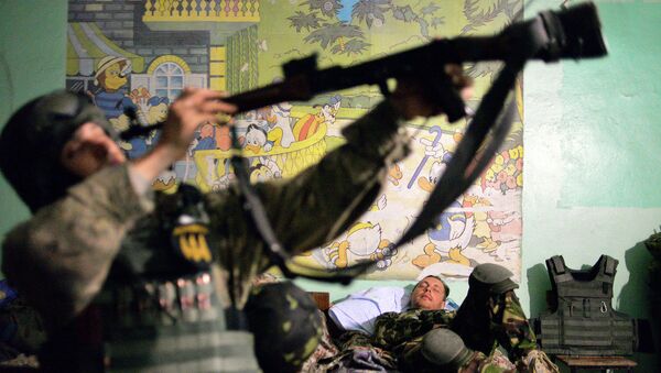 Cолдаты батальона Донбасс в селе Широкино, Донецкая область. Архивное фото Cолдаты батальона Донбасс в селе Широкино, Донецкая область. Архивное фото