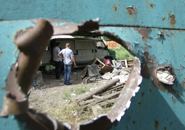 Последствия обстрела Донецка Последствия обстрела Донецка