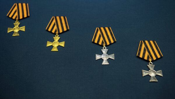 Знаки отличия военного ордена Святого Георгия I - IV степеней Знаки отличия военного ордена Святого Георгия I - IV степеней