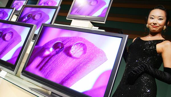 Телевизоры японского бренда Toshiba на стенде компании в Токио, Япония. Архивное фото Телевизоры японского бренда Toshiba на стенде компании в Токио, Япония. Архивное фото