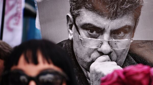 Участница марша памяти, посвященного годовщине гибели политика, общественного деятеля Бориса Немцова. Архив Участница марша памяти, посвященного годовщине гибели политика, общественного деятеля Бориса Немцова. Архив