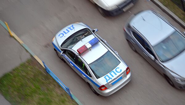 Полицейский автомобиль. Архивное фото Полицейский автомобиль. Архивное фото