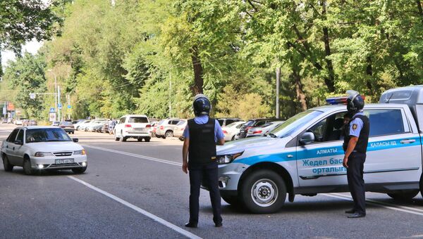 Последствия перестрелки возле отделения полиции в Алма-Ате Последствия перестрелки возле отделения полиции в Алма-Ате
