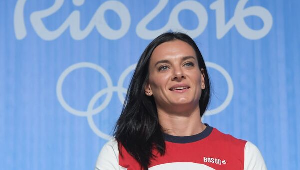 Двукратная олимпийская чемпионка в прыжках с шестом Елена Исинбаева. Архивное фото Двукратная олимпийская чемпионка в прыжках с шестом Елена Исинбаева. Архивное фото