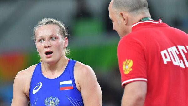 Инна Тражукова в поединке за третье место соревнований по вольной борьбе среди женщин в весовой категории до 63 кг на XXXI летних Олимпийских играх. Архивное фото Инна Тражукова в поединке за третье место соревнований по вольной борьбе среди женщин в весовой категории до 63 кг на XXXI летних Олимпийских играх. Архивное фото