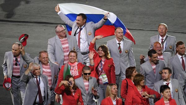 Представители Белоруссии во время парада атлетов и членов национальных делегаций на церемонии открытия XV летних Паралимпийских игр 2016 в Рио-де-Жанейро Представители Белоруссии во время парада атлетов и членов национальных делегаций на церемонии открытия XV летних Паралимпийских игр 2016 в Рио-де-Жанейро