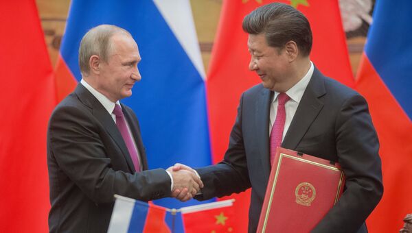Президент России Владимир Путин и председатель Китайской Народной Республики (КНР) Си Цзиньпин. Архивное фото Президент России Владимир Путин и председатель Китайской Народной Республики (КНР) Си Цзиньпин. Архивное фото
