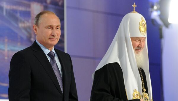 Президент РФ Владимир Путин и патриарх Московский и всея Руси Кирилл. Архивное фото Президент РФ Владимир Путин и патриарх Московский и всея Руси Кирилл. Архивное фото