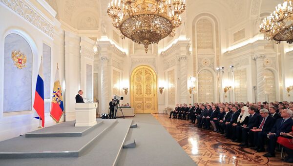 Президент РФ Владимир Путин выступает с ежегодным посланием Федеральному Собранию в Георгиевском зале Кремля. 1 декабря 2016 Президент РФ Владимир Путин выступает с ежегодным посланием Федеральному Собранию в Георгиевском зале Кремля. 1 декабря 2016