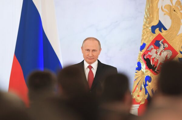 Президент РФ Владимир Путин выступает с ежегодным посланием Федеральному Собранию в Георгиевском зале Кремля. 1 декабря 2016 Президент РФ Владимир Путин выступает с ежегодным посланием Федеральному Собранию в Георгиевском зале Кремля. 1 декабря 2016