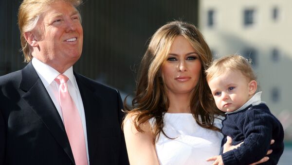 Дональд Трамп, его жена Меланья и сын Дональд Трамп, его жена Меланья и сын