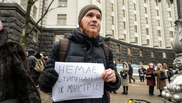 Участники акции профсоюзов за повышение социальных стандартов и снижение тарифов в Киеве. 8 декабря 2016 Участники акции профсоюзов за повышение социальных стандартов и снижение тарифов в Киеве. 8 декабря 2016