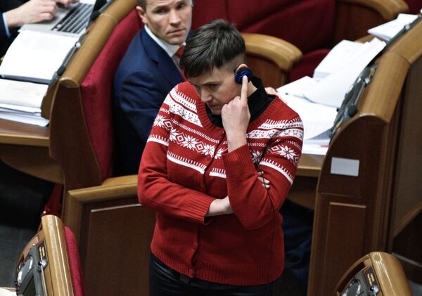 Депутат Верховной рады Надежда Савченко на заседании Верховной рады Украины в Киеве. 2016 год Депутат Верховной рады Надежда Савченко на заседании Верховной рады Украины в Киеве. 2016 год