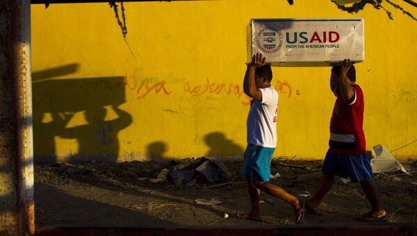 Доставка гуманитарного груза от агентства по международному развитию USAID. Архивное фото Доставка гуманитарного груза от агентства по международному развитию USAID. Архивное фото