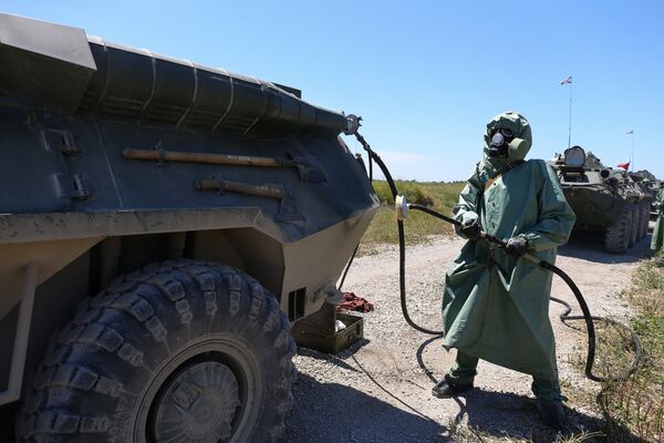 Выполнение норматива по РХБЗ во время всеармейского конкурса зенитчиков Чистое небо на полигоне Ейский в Краснодарском крае Выполнение норматива по РХБЗ во время всеармейского конкурса зенитчиков Чистое небо на полигоне Ейский в Краснодарском крае