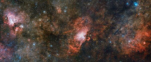 Облако газа Sharpless 2-54, туманности Орла и Омега снятые телескопом VST Облако газа Sharpless 2-54, туманности Орла и Омега снятые телескопом VST