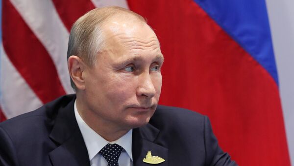 Президент РФ Владимир Путин во время встречи с президентом США Дональдом Трампом на полях саммита лидеров Группы двадцати G20 в Гамбурге. 7 июля 2017 Президент РФ Владимир Путин во время встречи с президентом США Дональдом Трампом на полях саммита лидеров Группы двадцати G20 в Гамбурге. 7 июля 2017