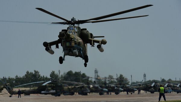 Вертолет Ми-28 во время учений отдельного вертолетного полка на аэродроме Черниговка в Приморском крае Вертолет Ми-28 во время учений отдельного вертолетного полка на аэродроме Черниговка в Приморском крае