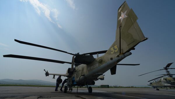 Вертолеты Ка-52 Аллигатор во время учений отдельного вертолетного полка на аэродроме Черниговка в Приморском крае Вертолеты Ка-52 Аллигатор во время учений отдельного вертолетного полка на аэродроме Черниговка в Приморском крае
