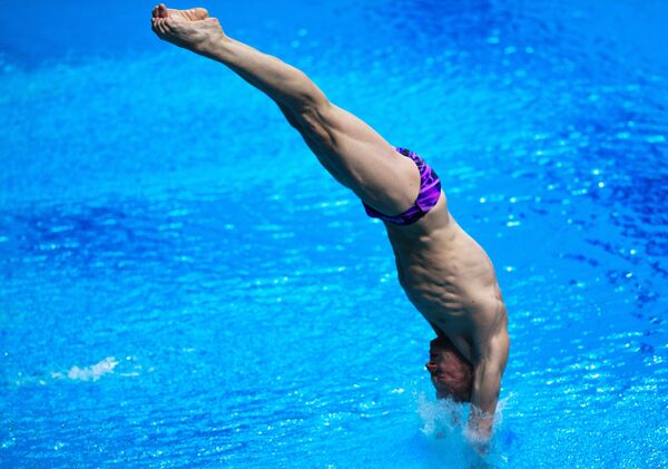 Илья Захаров (Россия) в финальных соревнованиях по прыжкам в воду с трамплина 3 м среди мужчин на XVII чемпионате мира по водным видам спорта в Будапеште