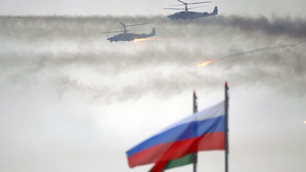 Вертолеты Ка-52 во время совместных стратегических учений вооруженных сил Республики Белоруссия и Российской Федерации Запад-2017. 20 сентября 2017 Вертолеты Ка-52 во время совместных стратегических учений вооруженных сил Республики Белоруссия и Российской Федерации Запад-2017. 20 сентября 2017