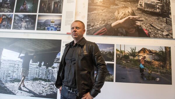 Фотокорреспондент МИА Россия сегодня Валерий Мельников представил свою серию работ Черные Дни Украины на открытии выставки World Press Photo в Санкт-Петербурге Фотокорреспондент МИА Россия сегодня Валерий Мельников представил свою серию работ Черные Дни Украины на открытии выставки World Press Photo в Санкт-Петербурге