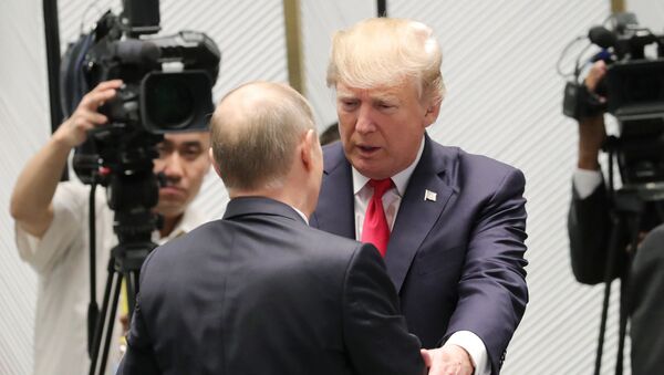 Президент США Дональд Трамп и президент РФ Владимир Путин. Архивное фото Президент США Дональд Трамп и президент РФ Владимир Путин. Архивное фото