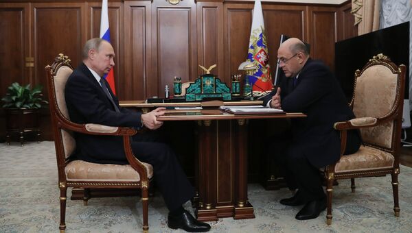Президент РФ Владимир Путин и руководитель Федеральной налоговой службы Михаил Мишустин во время встречи. 20 ноября 2017 Президент РФ Владимир Путин и руководитель Федеральной налоговой службы Михаил Мишустин во время встречи. 20 ноября 2017