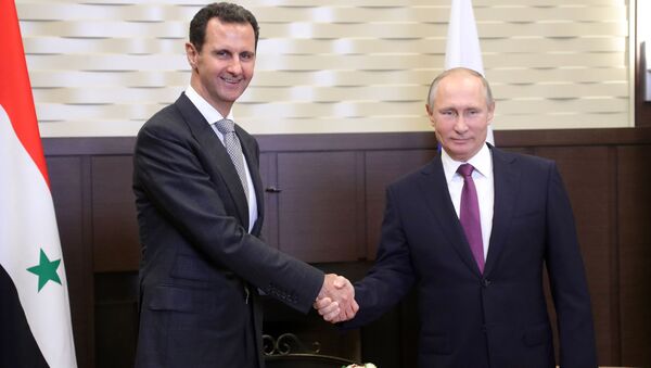 Президент РФ Владимир Путин и президент Сирии Башар Асад во время встречи Президент РФ Владимир Путин и президент Сирии Башар Асад во время встречи